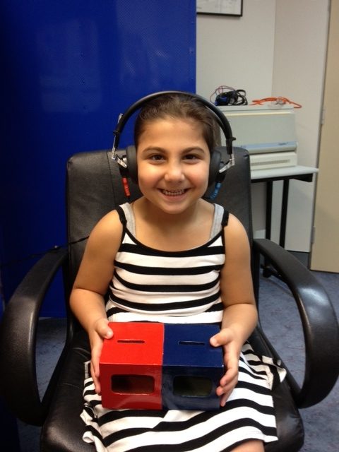 Girl having hearing test